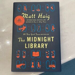 'The Midnight Library' Hardcover Book - Black and Orange